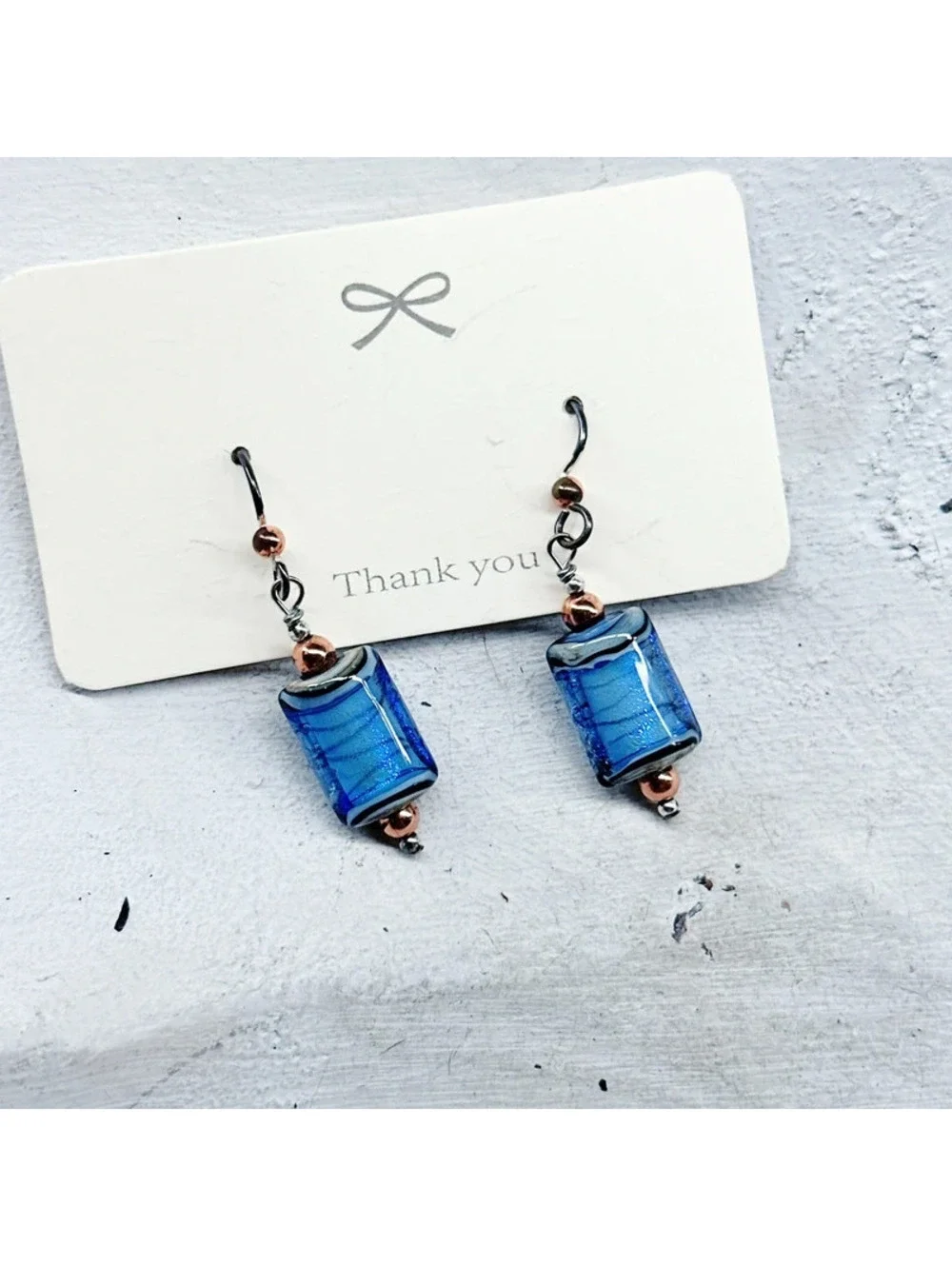 1058mc. Ribbon Blue Glass Earrings